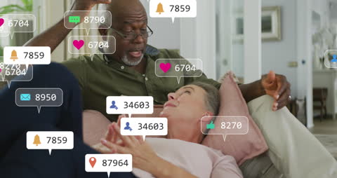 Elderly Couple Enjoying Social Media Together at Home