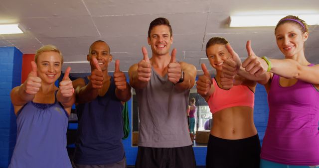 Group of Fit Friends Giving Thumbs Up in Gym - Download Free Stock Images Pikwizard.com