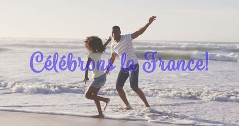 Father and Daughter Joyfully Running on Beach