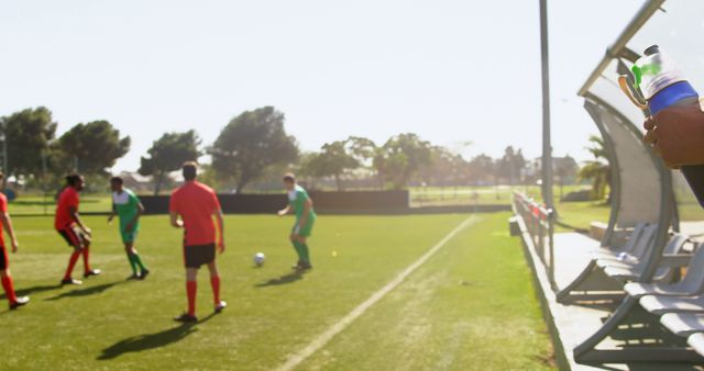 Soccer Players Practicing on Field with Referee - Download Free Stock Images Pikwizard.com