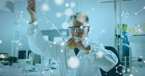 Scientist Analyzing Liquid in Laboratory with Molecular Overlay - Download Free Stock Images Pikwizard.com