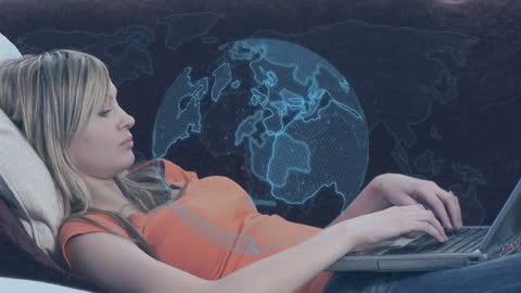 Woman Using Laptop with Digital Globe Animation in Background