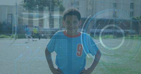 Young Soccer Player with Futuristic Digital Overlay on Field