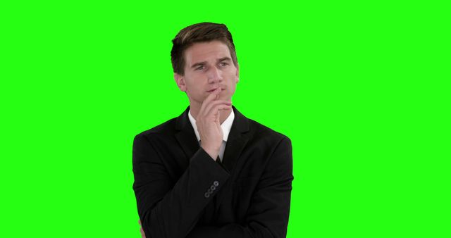 Man in Suit Deep in Thought Against Green Screen Background - Download Free Stock Images Pikwizard.com