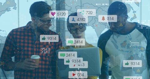 Team Reviewing Social Media Analytics on Laptop in Modern Office