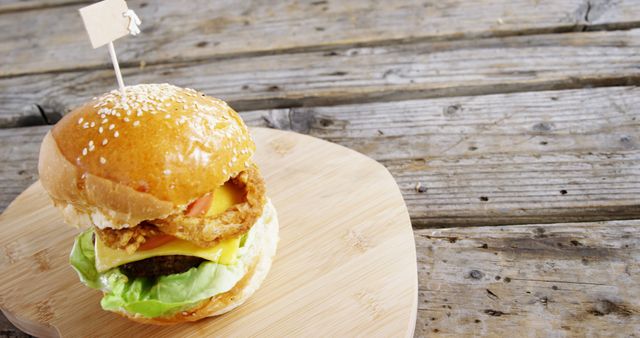 Delicious Cheeseburger with Crispy Onion Rings - Download Free Stock Images Pikwizard.com