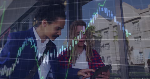 Diverse Professionals Analyzing Stock Market Data with Tablet