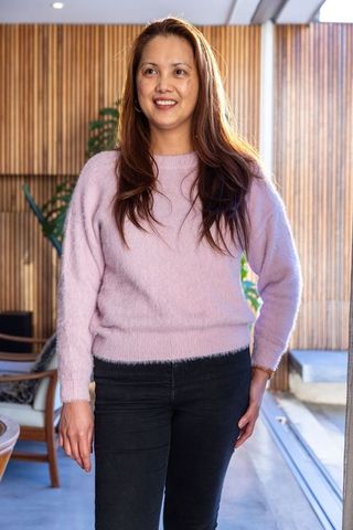 Asian Woman Posing in Modern Cozy Interior with Natural Light