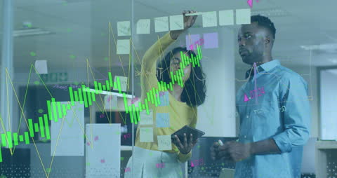 Coworkers Analyzing Financial Trends with Digital Graphs