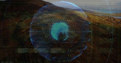 Holographic Globe with Futuristic Overlays over Rocky Valley