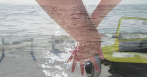 Romantic Couple Holding Hands with Beach Overlay Effect