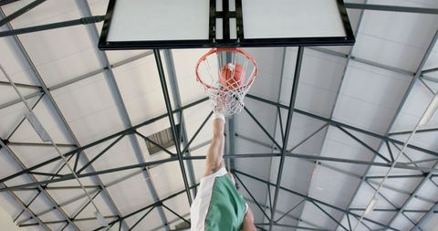 Basketball Finger Roll Dunk In Dynamic Motion - Download Free Stock Images Pikwizard.com