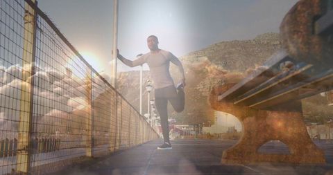 African american man stretching with scenic landscape in sunset harmony