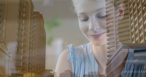 Smiling Woman Using Laptop with Cityscape Background