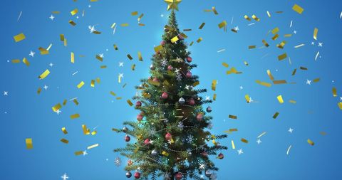 Christmas Tree Decorated with Ornaments Under Confetti and Snowflakes - Download Free Stock Images Pikwizard.com