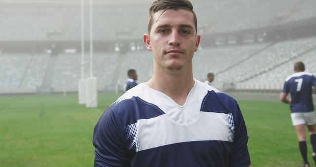 Confident Rugby Player Standing on Misty Sports Field - Download Free Stock Images Pikwizard.com