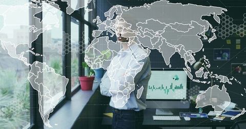 Professional Man in Urban Office with World Map Overlay