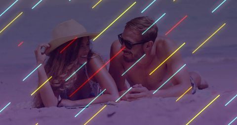 Beach Couple Relaxing with Neon Streaks