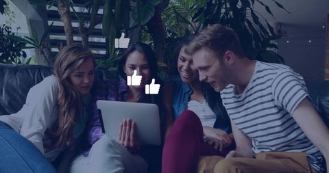 Friends enjoying tablet and social media interaction in living space