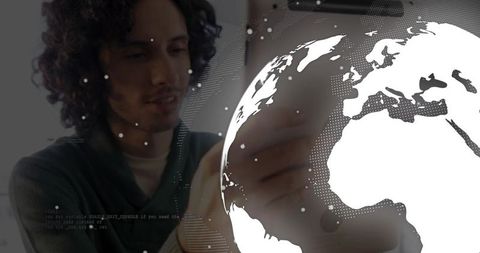 Man using digital tablet with holographic map interface technology