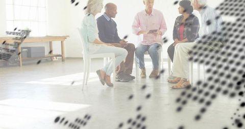 Leading facilitator guiding diverse adult support group in circle with dotted overlay