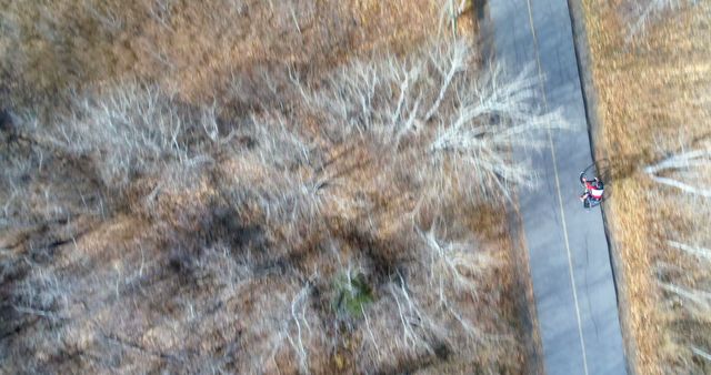 Aerial View of Cyclist on Rural Path in Autumn - Download Free Stock Images Pikwizard.com