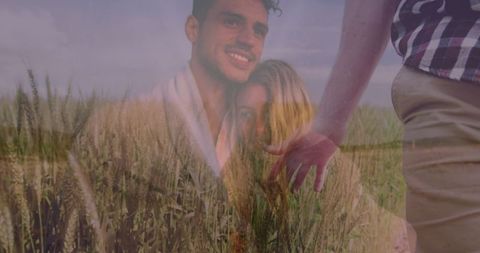 Romantic couple embracing in sunlit wheat field