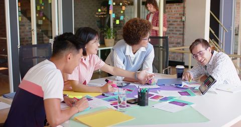 Diverse Team Engaging in Creative Office Brainstorming Session