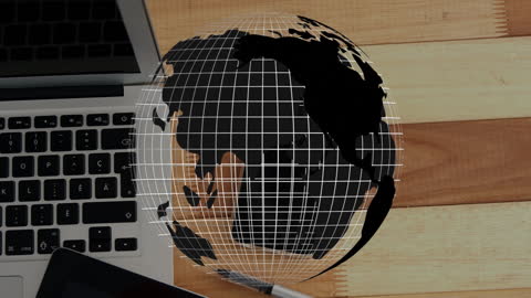 Digital Globe Overlapping Laptop Showcasing Global Technology