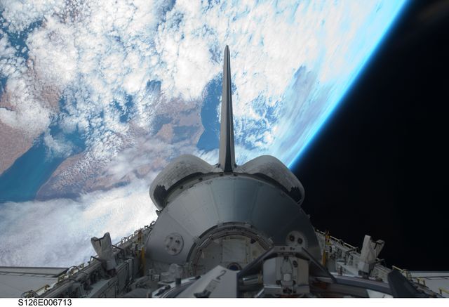 Space Shuttle Endeavour in Orbit with Earth and Space Background - Download Free Stock Photos Pikwizard.com