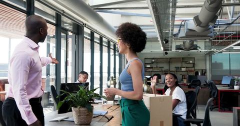 Welcoming New Team Member at Modern Office Workspace