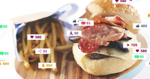Crispy bacon cheeseburger with fries and social media engagement icons overlay