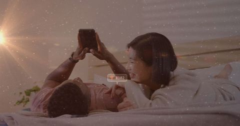 Diverse Couple Engaging with Social Media on Smartphone