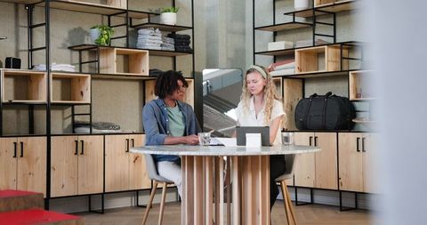 Diverse Professionals Collaborating at Modern Office Meeting