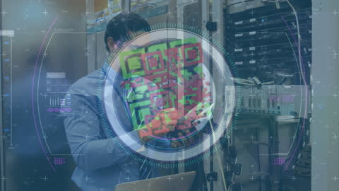 Biracial Man in Server Room Analyzing Tech Data