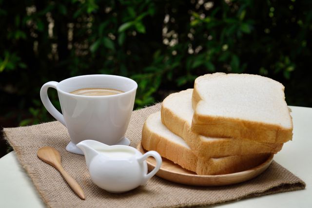 3 Sliced Loafs Beside White Ceramic Coffee Cup - Download Free Stock Photos Pikwizard.com