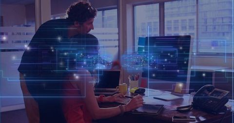 Colleagues Contributing to Project in Office With Tech Overlay