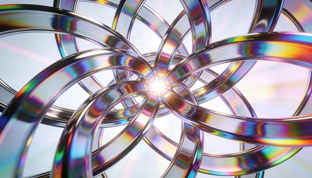 Iridescent chrome rings radiating from central flare with rainbow fringes and symmetry