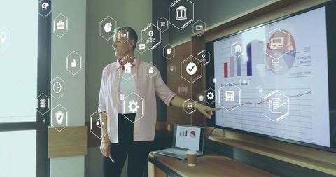 Confident Professional Presenting Analytics in High-Tech Meeting