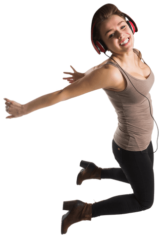 cheerful woman jumping while enjoying music with headphones transparent background - Download Free Stock Videos Pikwizard.com