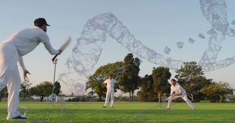 Cricket batsman swinging on park field with geometric wireframe effects and teammates