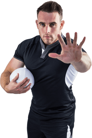 Determined Rugby Player Holding Ball Making Stop Gesture