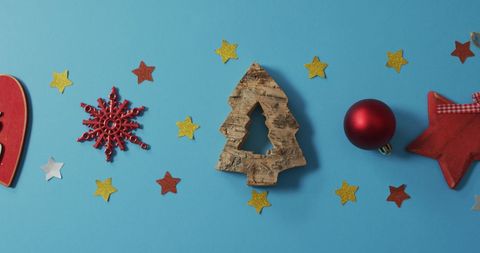 Holiday Decor with Christmas Shapes and Ornaments on Blue - Download Free Stock Images Pikwizard.com