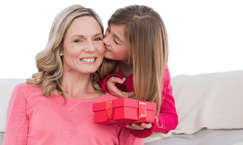 Transparent Female Child Giving Sweet Surprise to Smiling Mother