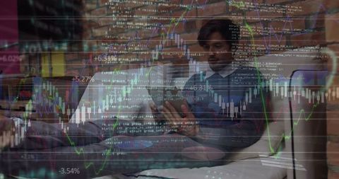 Businessman Analyzing Data on Tablet with Digital Graph Overlay