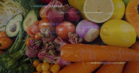 Overhead Market Produce Display Filling Frame with Carrots, Lemons, Avocado, Tomatoes