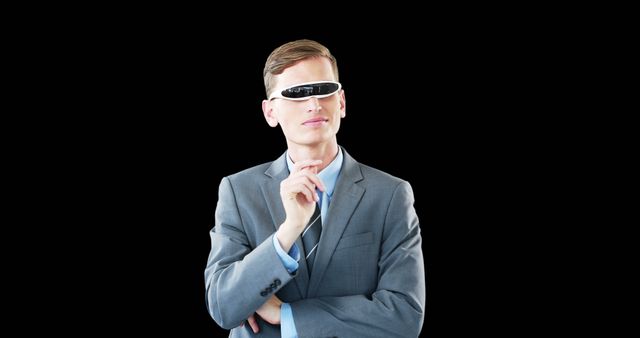 Man Pondering with Futuristic Smart Glasses on Isolated Black Background - Download Free Stock Images Pikwizard.com