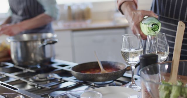 Couple Enjoying Wine While Cooking together in Modern Kitchen - Download Free Stock Images Pikwizard.com