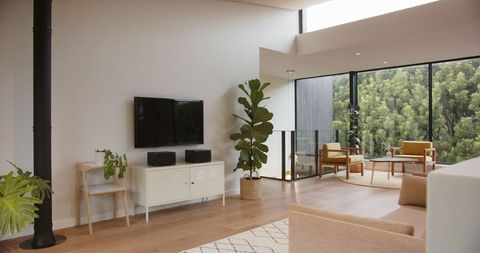 Minimalist Modern Living Room with Scenic View Opening Outdoors