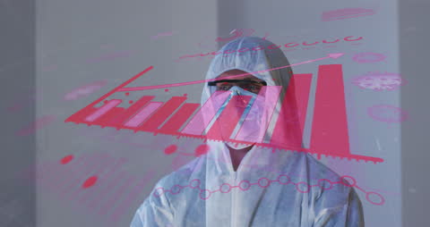 Caucasian Doctor Analyzing Digital Biometrics in Protective Gear